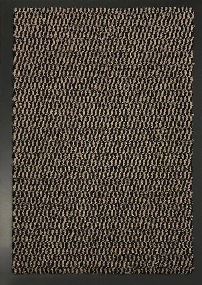 Detailed Textured View of a Rubber Edged Brown Doormat