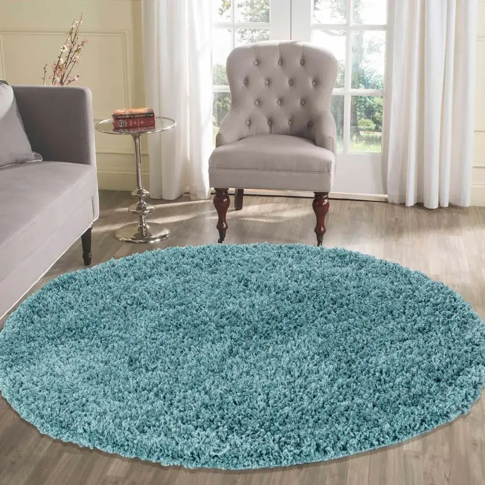 soft duck egg round shaggy rug in a modern living room