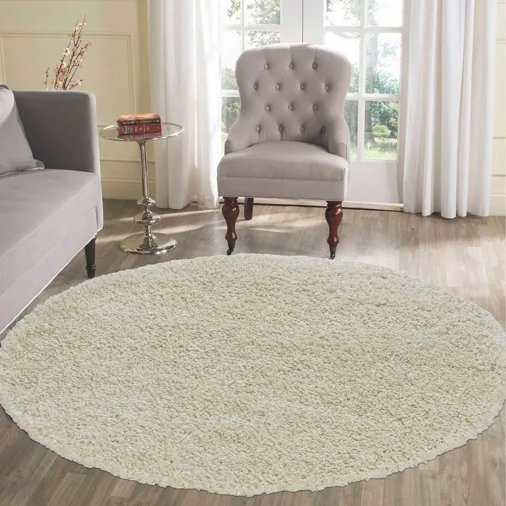 soft ivory round shaggy rug in a modern living room