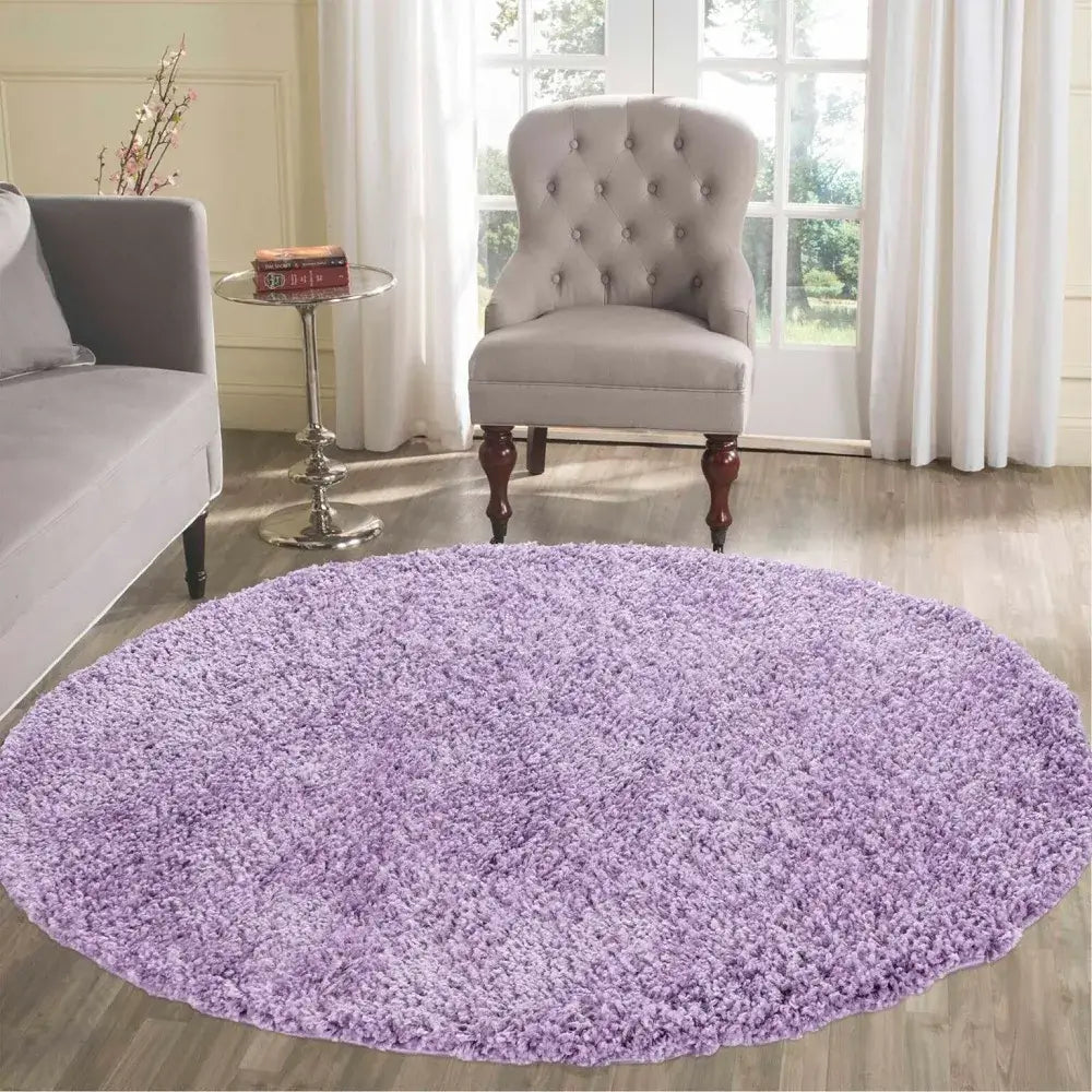 soft lilac round shaggy rug in a modern living room