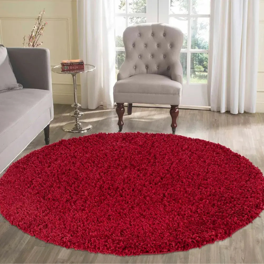 soft red round shaggy rug in a modern living room