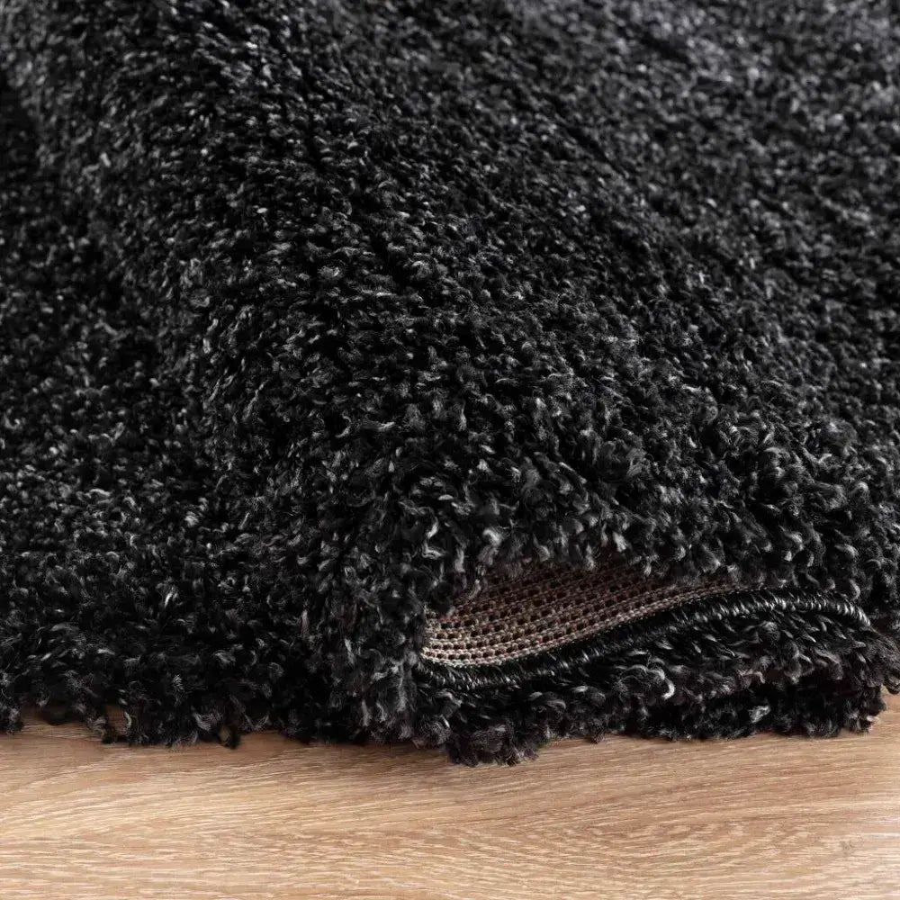closeup of soft anthracite shaggy rug in a modern living room