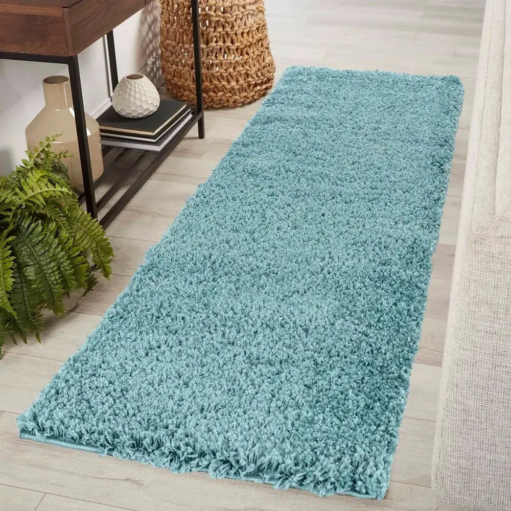soft duck egg shaggy runner rug in a modern living room