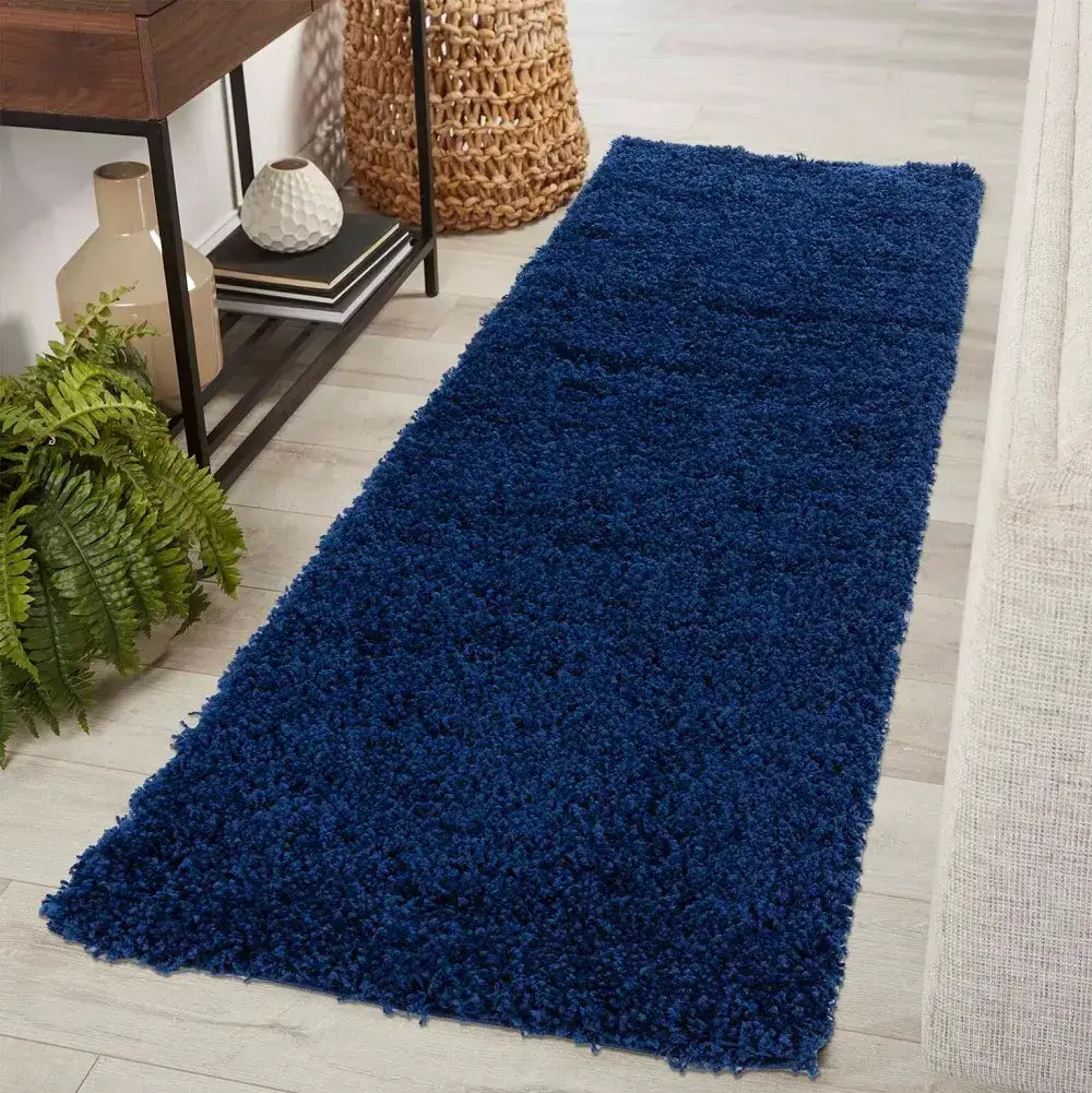 soft navy blue shaggy runner rug in a modern living room