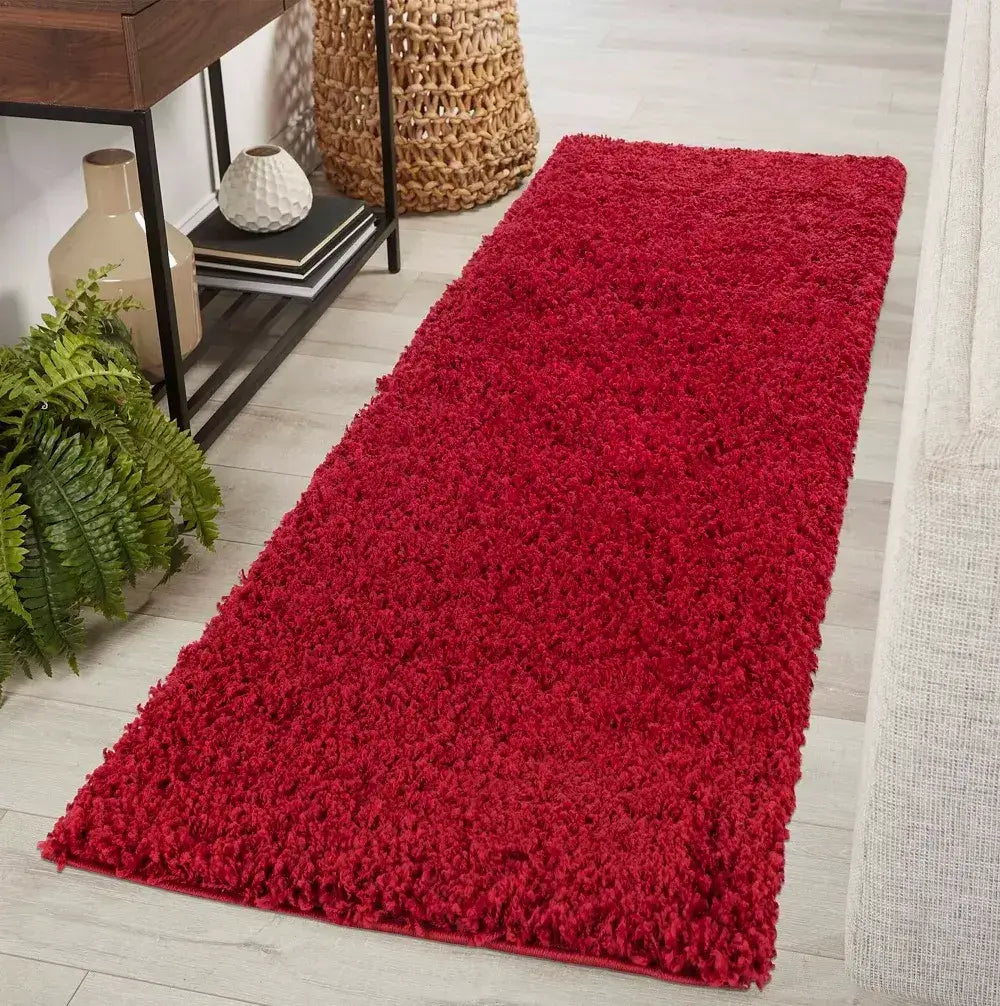 soft red shaggy runner rug in a modern living room