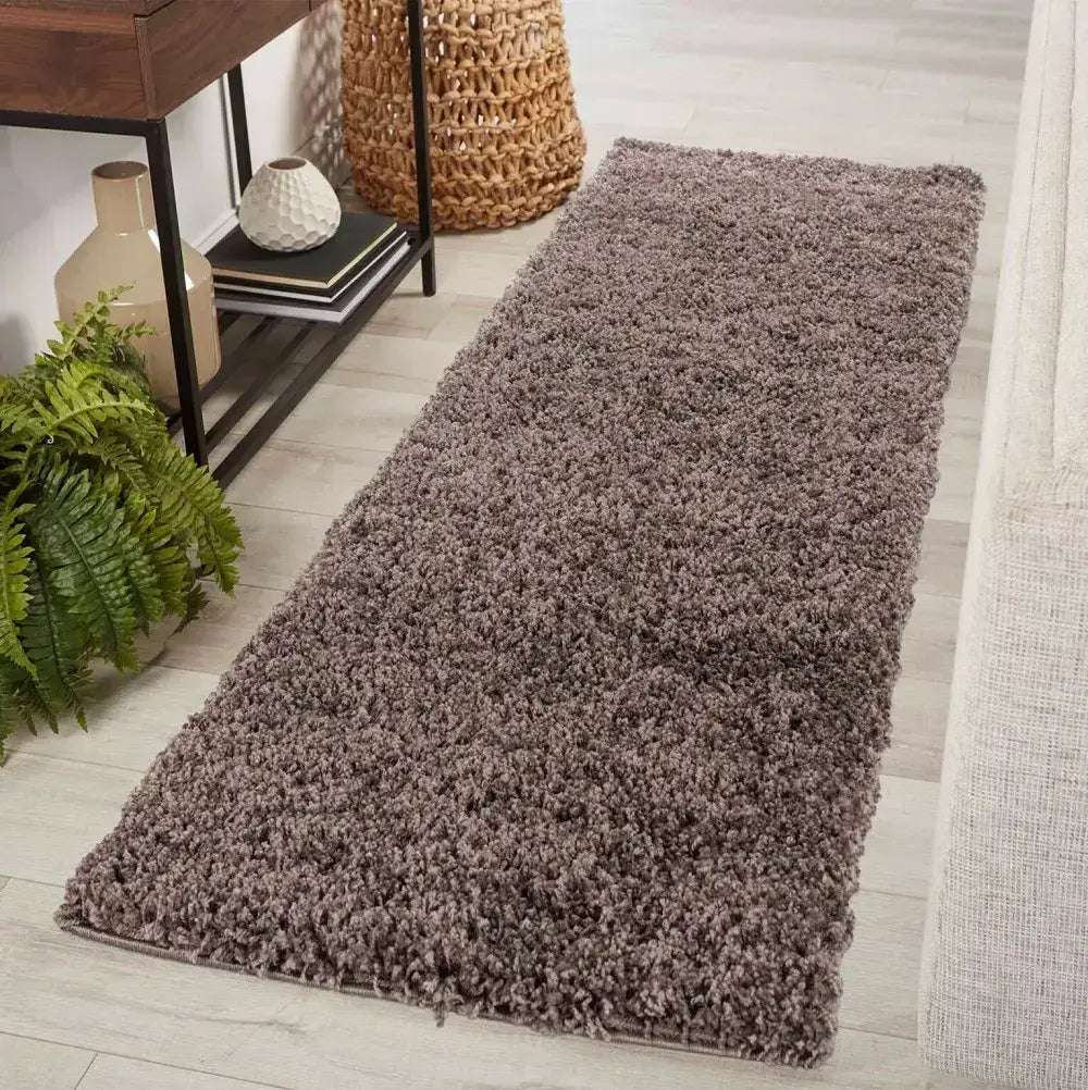 soft taupe shaggy runner rug in a modern living room
