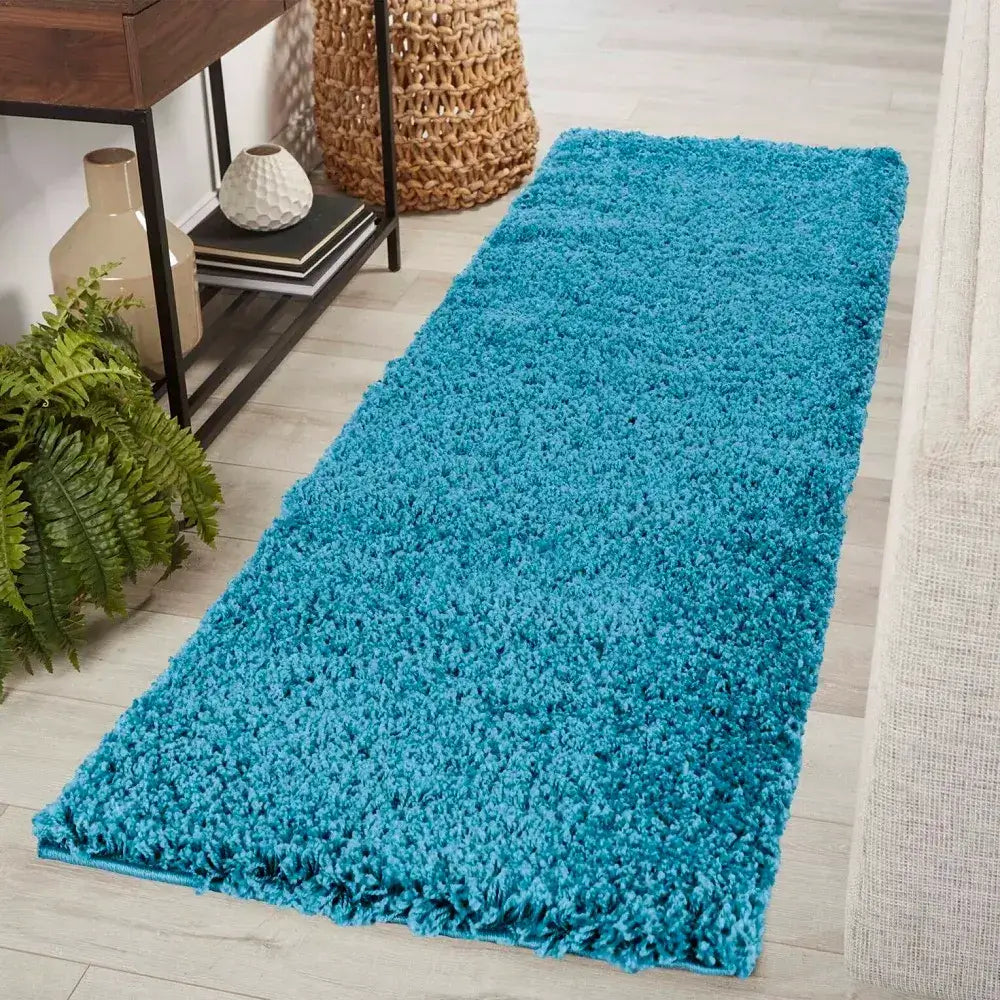 soft teal shaggy runner rug in a modern living room