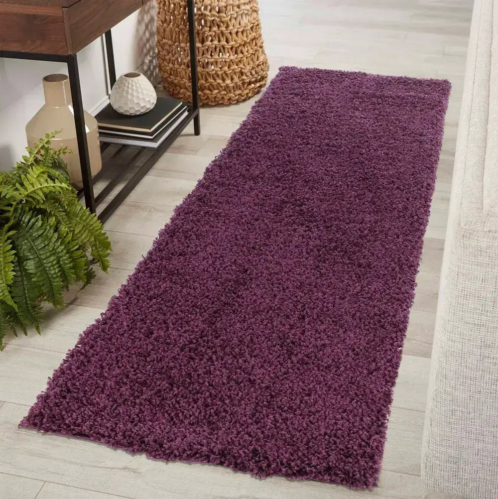 soft violet shaggy runner rug in a modern living room