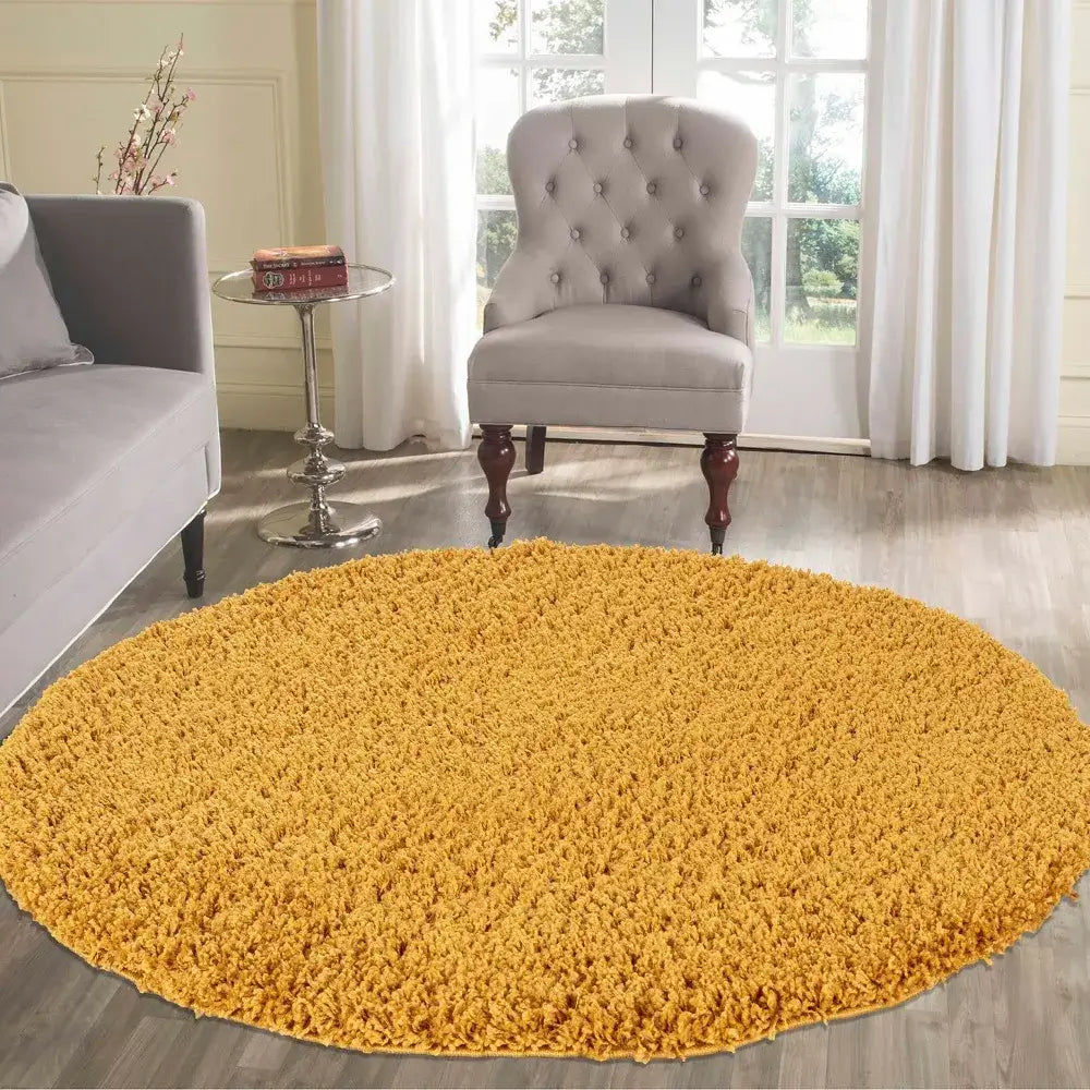 soft gold round shaggy rug in a modern living room