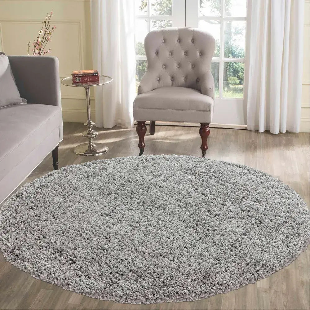 soft grey round shaggy rug in a modern living room