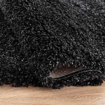 closeup of soft anthracite shaggy rug in a modern living room