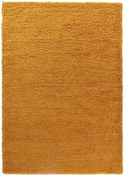 detailed textured view of gold shaggy rug