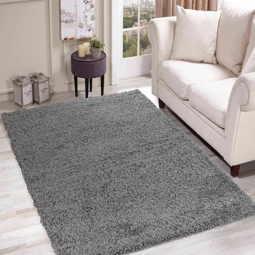 side view of soft grey shaggy rug in a modern living room