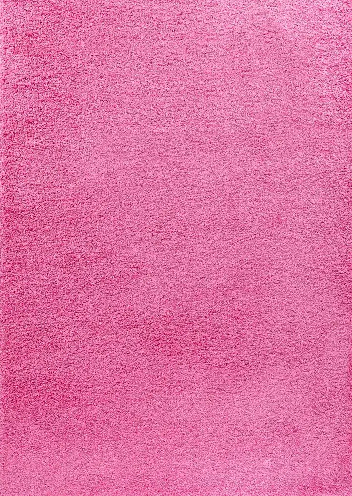 detailed textured view of pink shaggy rug